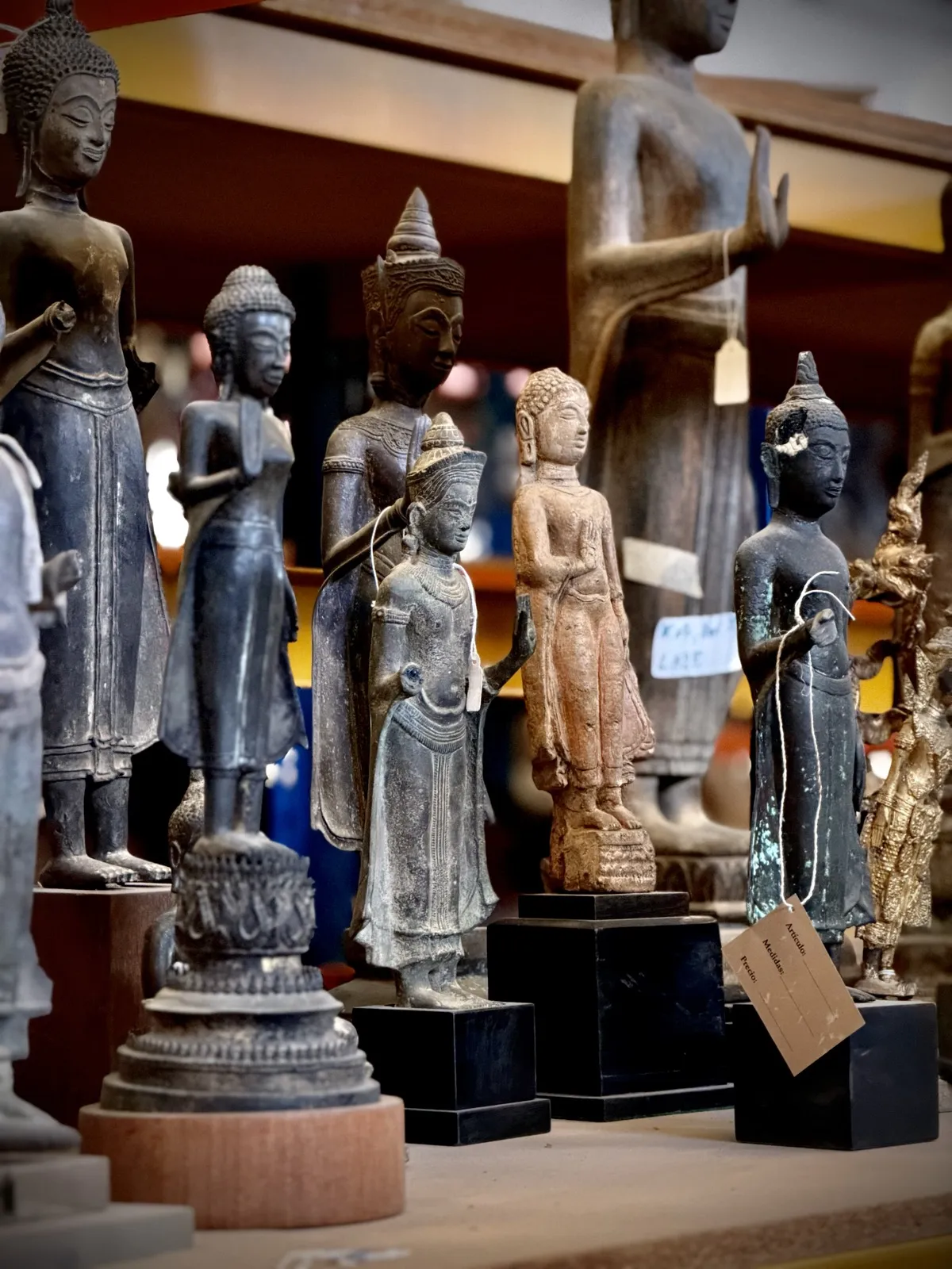 Standing bronze Buddha figures