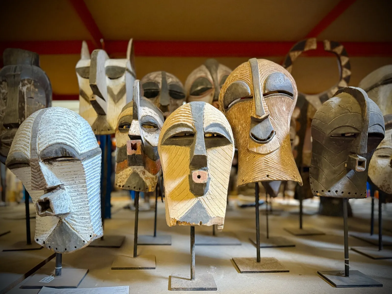 Striped Kifwebe-style masks