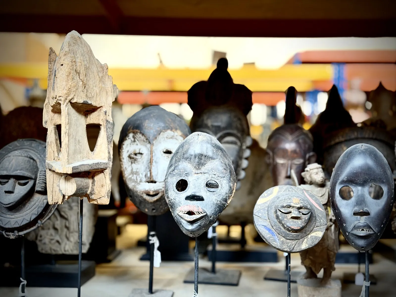 Assorted African masks including Dogon