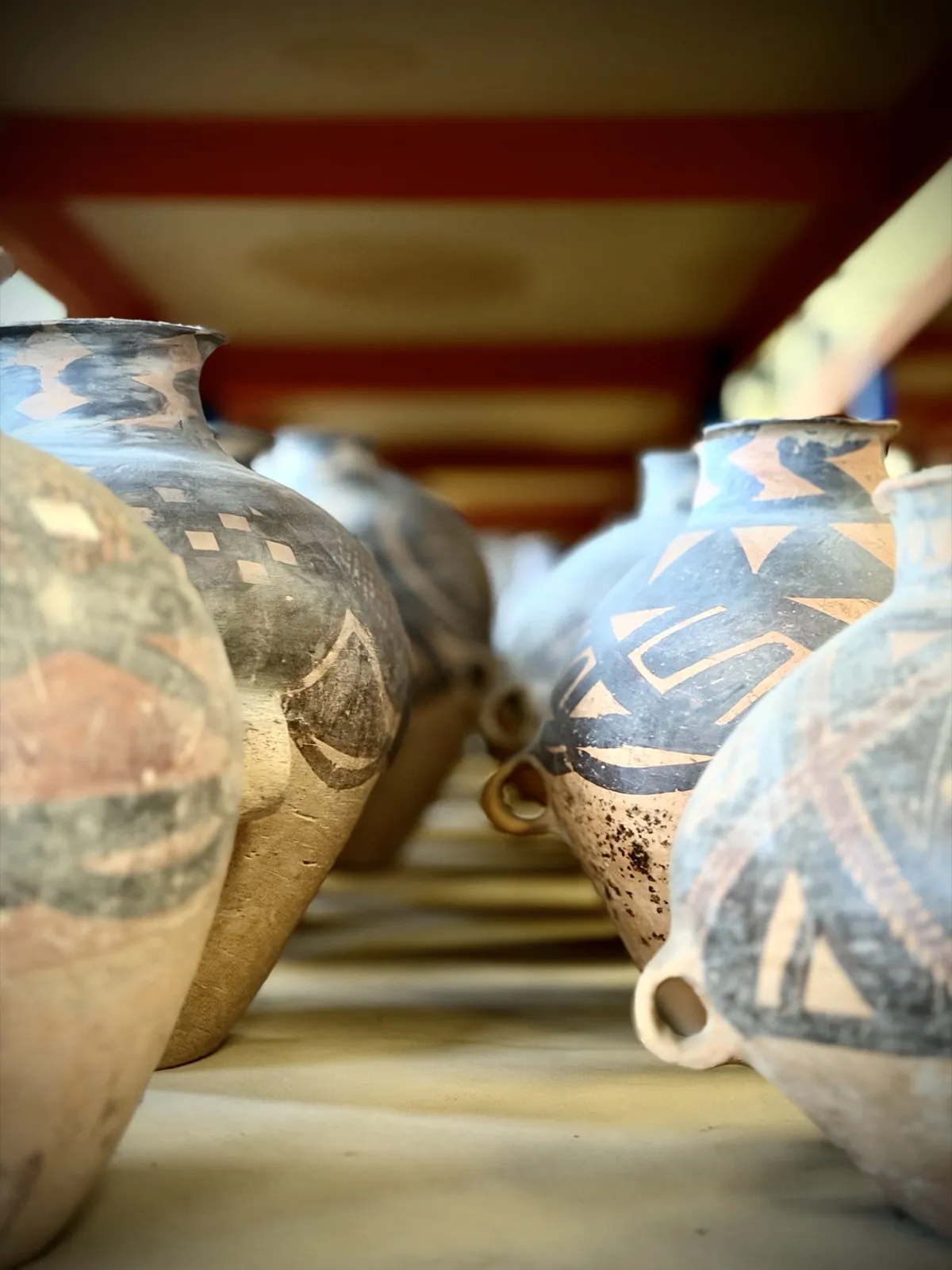 Neolithic painted earthenware jars with geometric decoration