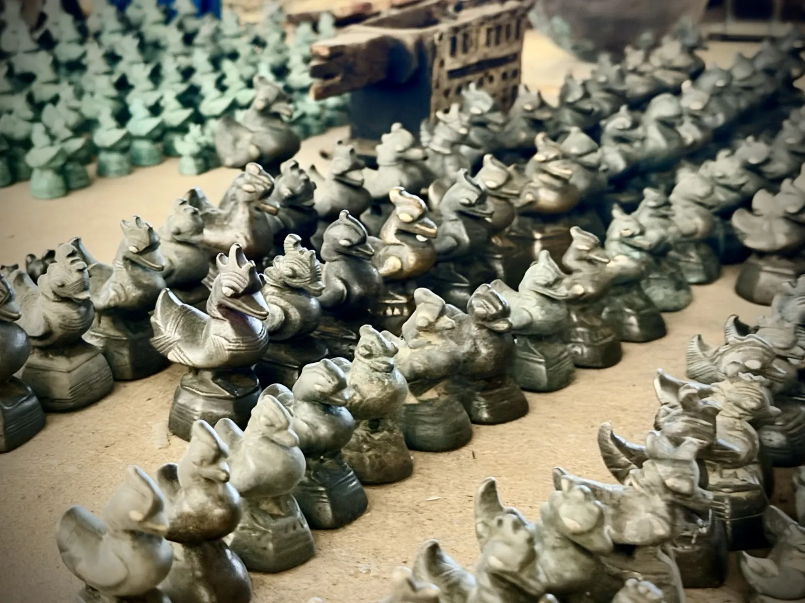 Rows of small bronze deity figures